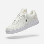 Embossed Monogram Leather Sneakers