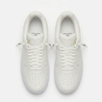 Embossed Monogram Leather Sneakers