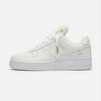 Embossed Monogram Leather Sneakers